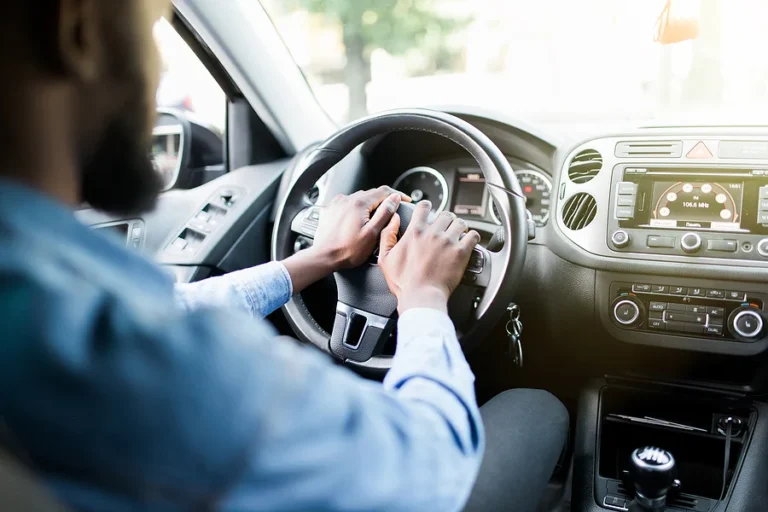 Angry aggressive driver beep and shouts in the car. Road rage concept.