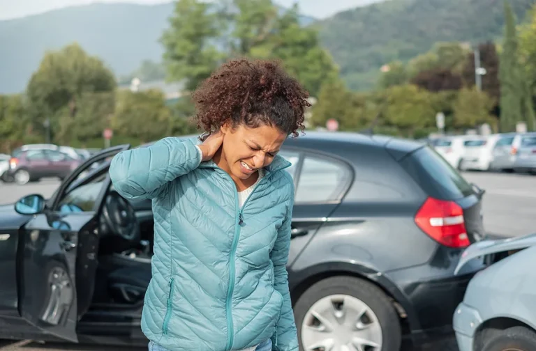 Painful whiplash after fender bender car crash