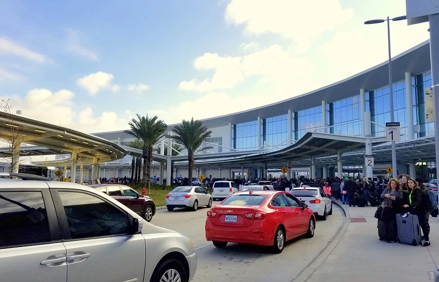 New Orleans, Louisiana, U.S.A - January 31, 2020 - Uber and Lyft cars waiting for passengers at the airport