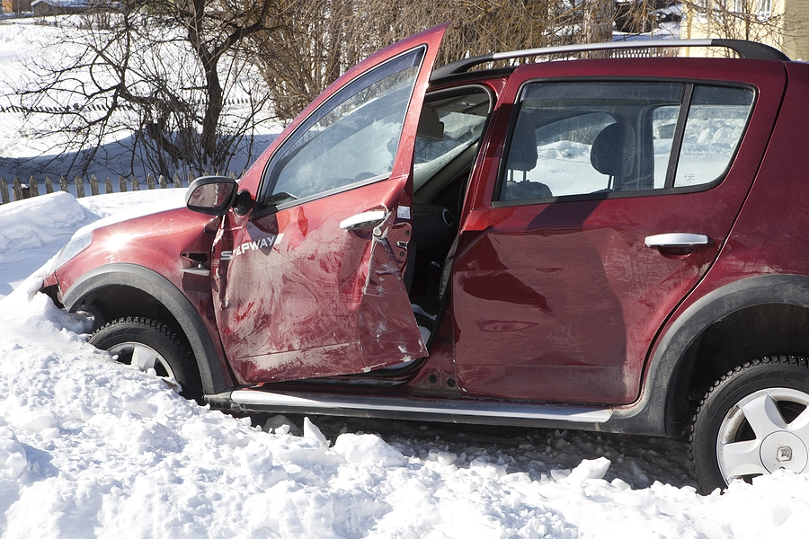 abandoned vehicle with damage after a pinkham car accident