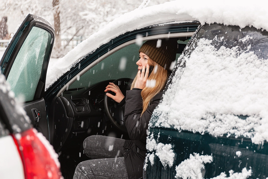 young driver in north dakota calls her insurance company to report that she was in a car accident in the snow